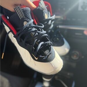 navy blue and White foam Sneakers with Red Accents